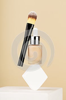 Professional makeup products levitate and balance on white sponge on stand. Bottle foundation liquid bb cream, accessory