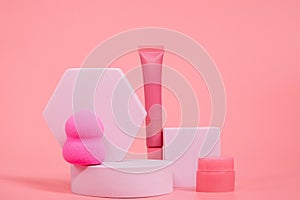 Professional makeup tools. Products for makeup on pink background. A set of various products for makeup