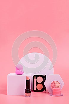 Professional makeup tools. Products for makeup on pink background. A set of various products for makeup