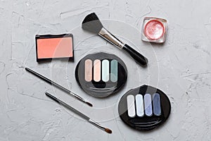 Professional makeup tools. Top view. Flat lay. Beauty, decorative cosmetics. Makeup brushes set and color eyeshadow