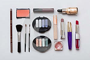 Professional makeup tools. Top view. Flat lay. Beauty, decorative cosmetics. Makeup brushes set and color eyeshadow