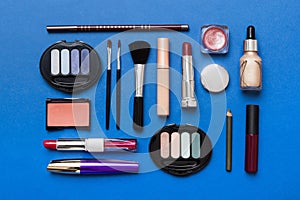 Professional makeup tools. Top view. Flat lay. Beauty, decorative cosmetics. Makeup brushes set and color eyeshadow