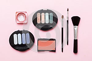 Professional makeup tools. Top view. Flat lay. Beauty, decorative cosmetics. Makeup brushes set and color eyeshadow