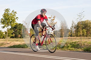 Professional Male Cyclist in Racing Outfit