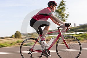 Professional Male Cyclist During a Ride on Bike Outdoors