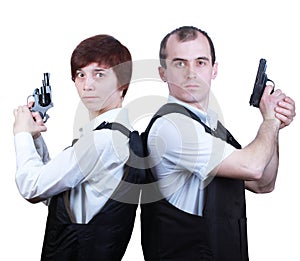 Professional man and woman with guns