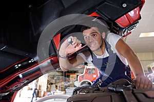 professional mechanic repairing car