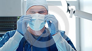 Professional medical doctor in emergency medicine room, Portrait of young and confident physician.