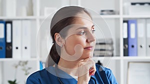 Professional medical doctor in hospital office, Portrait of young and attractive female physician.