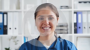 Professional medical doctor in hospital office, Portrait of young and attractive female physician.