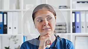 Professional medical doctor in hospital office, Portrait of young and attractive female physician.