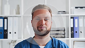 Professional medical doctor in hospital office, Portrait of young and confident physician.