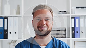 Professional medical doctor in hospital office, Portrait of young and confident physician.