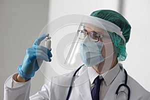 Professional medical doctor in hospital office. Portrait of young and confident physician. Medical concept.