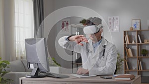 Professional medical doctor looking for a patient's medical record in hospital office using virtual reality