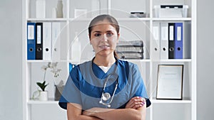 Professional medical doctor working in hospital office, Portrait of young and attractive female physician.