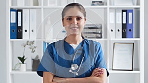 Professional medical doctor working in hospital office, Portrait of young and attractive female physician.