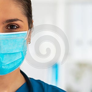 Professional medical doctor working in hospital office, Portrait of young and attractive female physician in protective