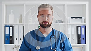 Professional medical doctor working in hospital office, Portrait of young and confident physician.