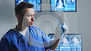 Professional medical doctor working in hospital office using computer technology. Medicine, cardiology and healthcare.