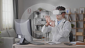 Professional medical doctor working in hospital office using virtual reality technology
