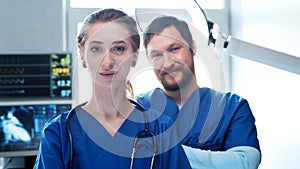 Professional medical doctors working in emergency medicine. Portrait of the surgeon and the nurse preparing for a