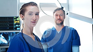 Professional medical doctors working in emergency medicine. Portrait of the surgeon and the nurse preparing for a