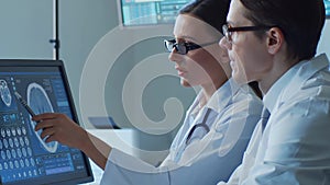 Professional medical doctors working in hospital office making computer research. Medicine, healthcare and technology