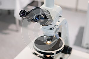 Professional medical microscope in science lab, exhibition