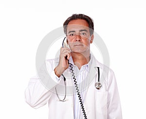 Professional medidal doctor talking on phone