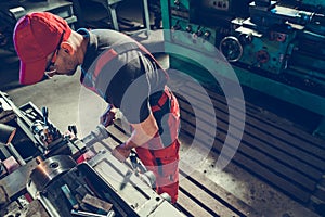 Professional Metal Worker Operating Lathe Machine