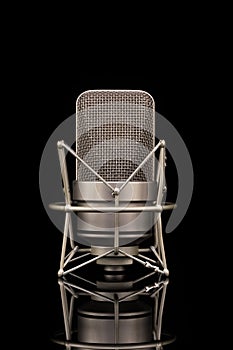 Professional microphone on black background, mic