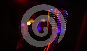 Professional microphone on black background