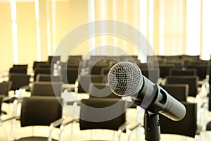 Professional microphone in meeting room.