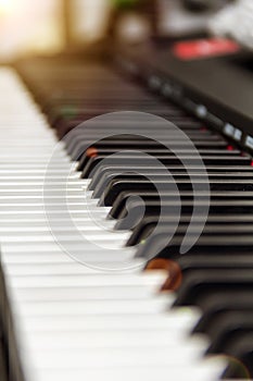 Professional midi keyboard piano keys.Electronic synthesizer piano key board.Play music,compose new music in sound recording studi photo