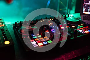 Professional mixer Board DJ for mixing and mixing club music at party with buttons and volume levels