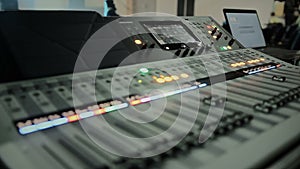 Professional mixing console with faders and adjusting knobs, sound equipment