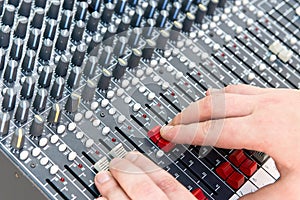 Professional mixing console in studio