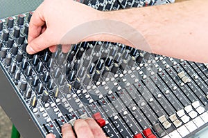 Professional mixing console in studio.