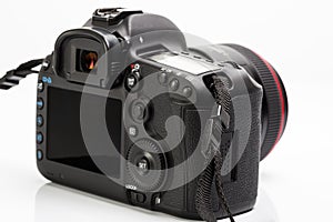 Professional modern DSLR camera low key image