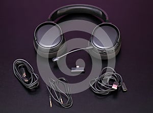 Professional Modern headphones with a microphone for gamers on a black background