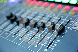 A professional music console called an audio mixer used to publicize concerts and other music events.