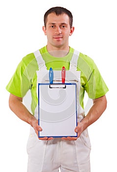 Professional painter holding empty clipboard with