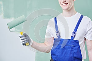 Professional painter with roller photo