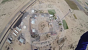 Professional parachute jumper parachuting above arizona. Landscape. Scenery.