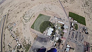 Professional parachute jumper parachuting above arizona. Scenery. Horizon.
