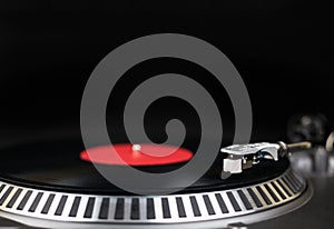 Professional party djs turntable close-up shot. Analog stage audio equipment for concert in nightclub. Play mix music