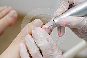 Professional Pedicure procedure with device in beauty  spa salon