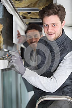 Professional pest control team checks humidity