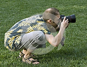 Professional photographer in action outdoors